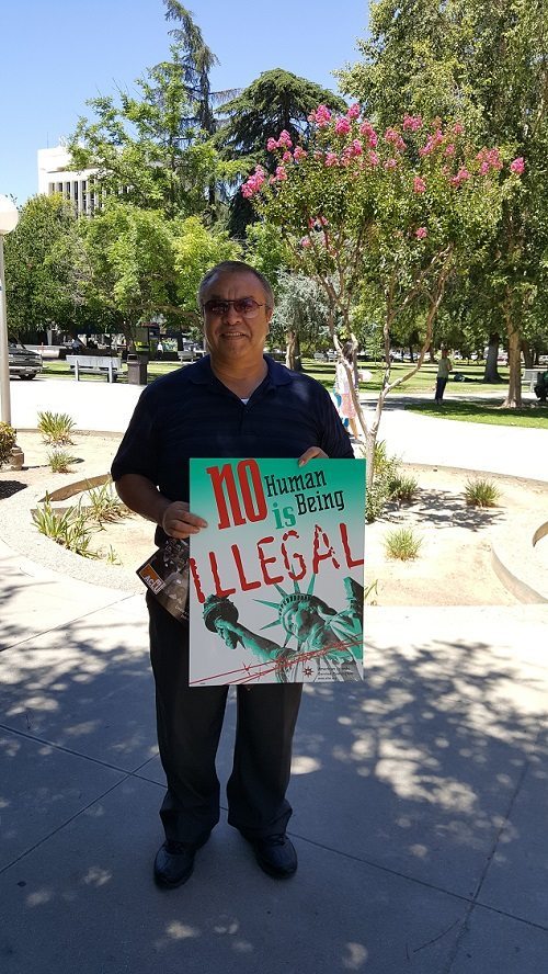 Supporter at rally against ICE on June 23. Image by Hannah Brandt