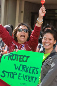 San Francisco demonstrators call for an end to immigration-based firings