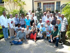 Some 2012 Caravanistas in Villa Clara, with veterans who fought with Che Guevara. Gerry Bill is seated in front, and Leni V. Reeves is third from right.
