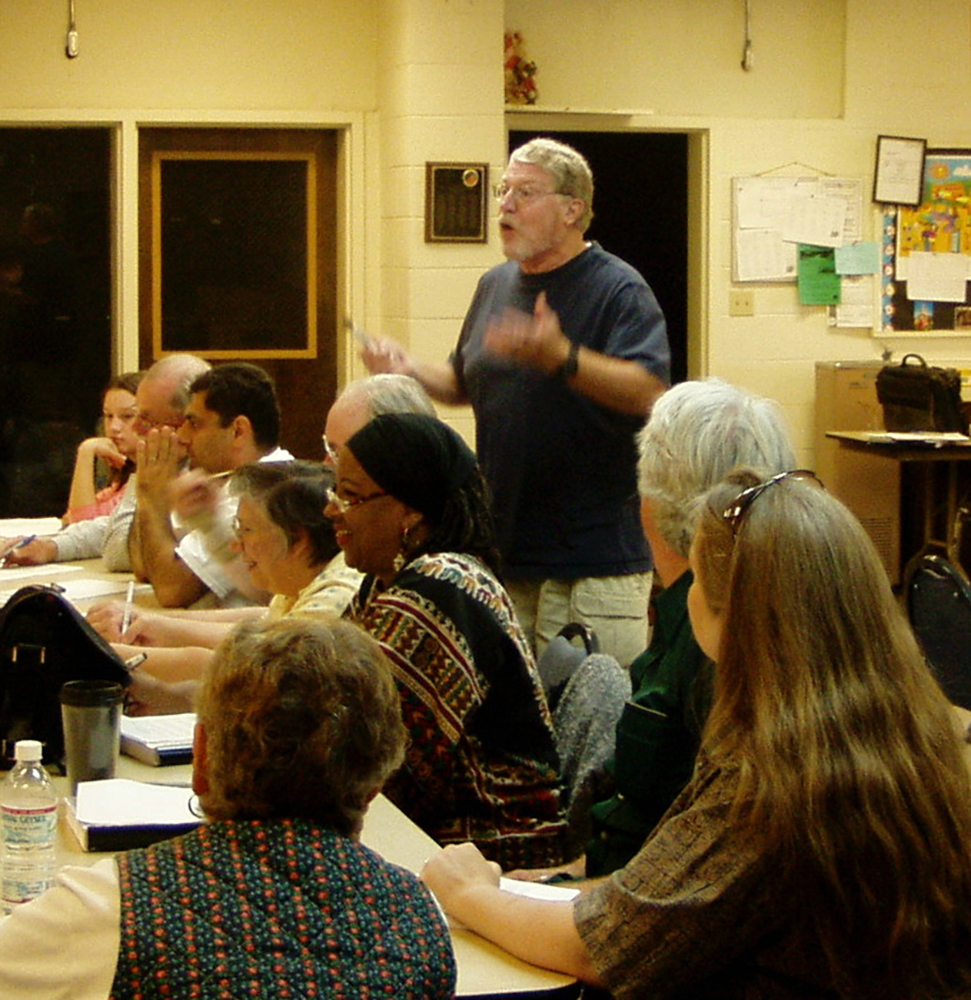 Conn Hallinan speaking at a writers workshop in Fresno on Feb. 13, 2006. Photo by Mike Rhodes 