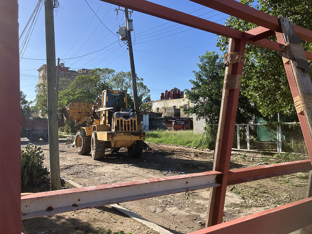 The day after the hurricane, working crews started clearing debris and restoring posts and lines. Photo by Leni Villagomez Reeves