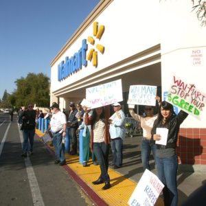 Local protesters support poorly paid Walmart workers outside the Clovis location. Photo by Mike Rhodes 