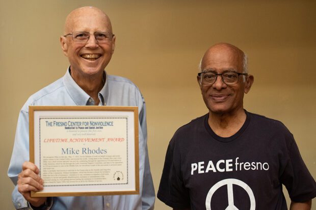 Mike Rhodes speaks after receiving a lifetime achievement award from the Fresno Center for Nonviolence. Photo by Peter Maiden