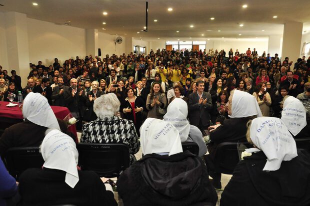 In its extensive work of recognition and defense of human rights, the Superior Council of the National University of La Plata unanimously approved granting the title of Doctor “Honoris Causa” to the Mothers of Plaza de Mayo, Founding Line. The Mothers of Plaza de Mayo played a key role in the DNA research of stolen children during the dictatorship in Argentina (1976–1982). Photo courtesy of Universidad de La Plata/The Commons