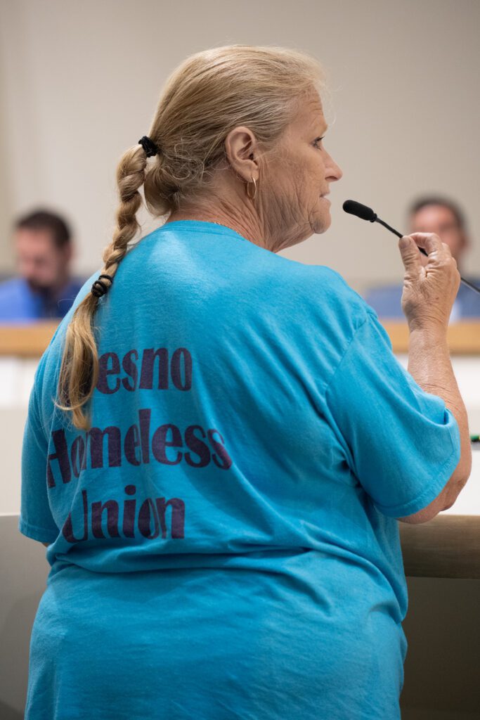 Cindy, an advocate with the Fresno Homeless Union, addresses the City Council. Photo by Peter Maiden