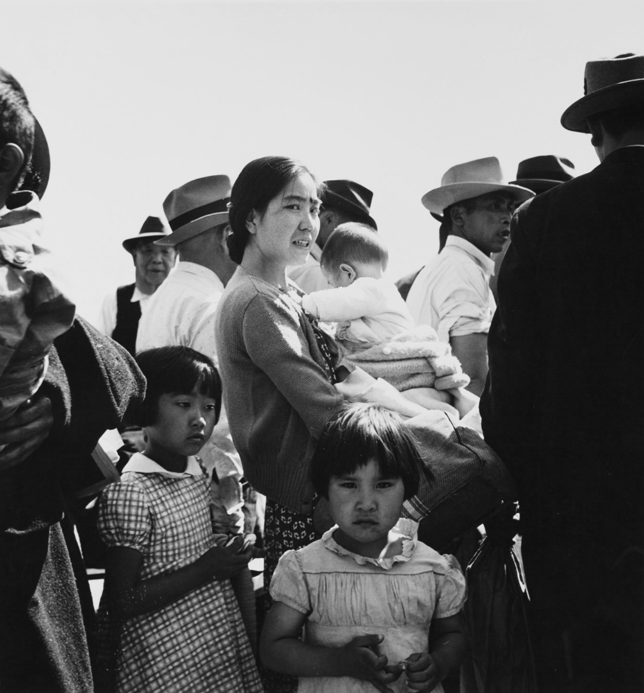 Families of Japanese ancestry arrive at the Turlock Assembly Center on May 2, 1942.