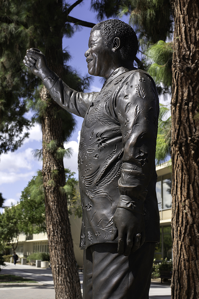 The Nelson Mandela statue in Fresno State’s Peace Garden, where it is placed among statues of Dr. Martin Luther King Jr., Mahatma Gandhi, Jane Addams and César Chávez. Photo by Peter Maiden