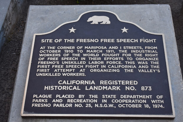 In 1910–11, the Industrial Workers of the World held an important Free Speech fight on the streets of Fresno. This historical landmark is a part of Mariposa Plaza. Photo by Mike Rhodes