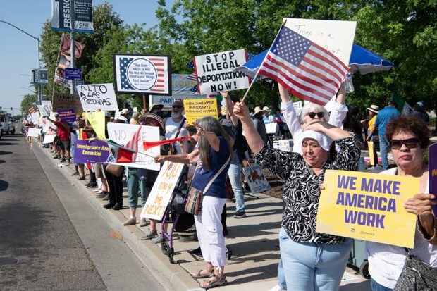 Hundreds of people protested on Blackstone Avenue near Alluvial on May 1 in Fresno. Photo by Peter Maiden
