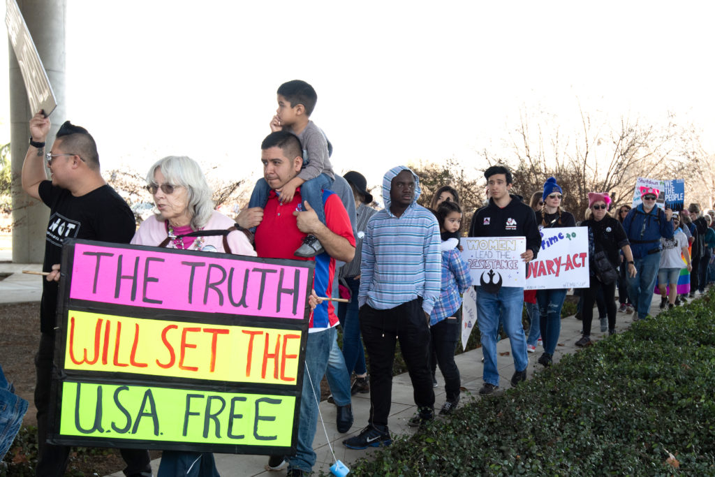 Women, men and children took to the streets in Fresno