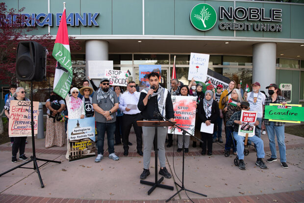 In front of the downtown Fresno building where Rep. Jim Costa’s office is located, a Palestinian named Kareem spoke about his family, many of whom are still in Palestine. Photo by Peter Maiden