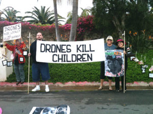 Mike Bridges, Beverly Fitzpatrick and Teresa Castillo participate in the National Anti-Drone Days of Action demonstrations in San Diego.