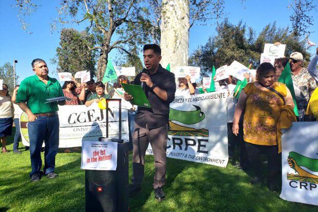 Angel Garcia of Californians for Pesticide Reform addresses the crowd in Shafter at a press conference on the state’s new online pesticide notification system. Photo courtesy of Cristina Gutierrez