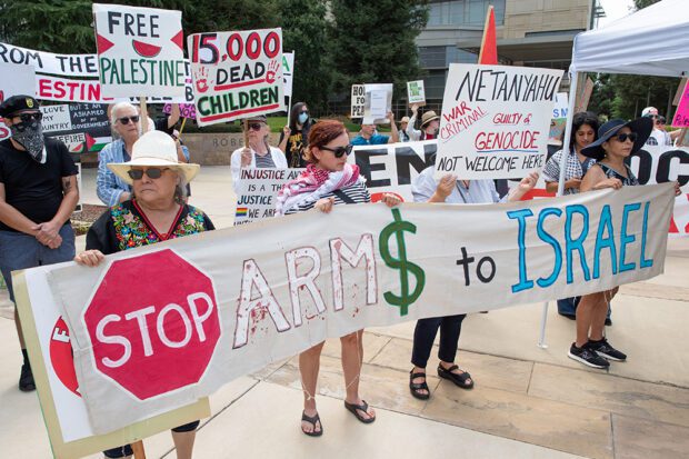 About 60 people came to the Federal Building in Fresno on July 24 to protest Israeli Prime Minister Benjamin Netanyahu speaking to Congress in Washington, D.C. The event was organized by Raza Against War, which holds protests weekly at the Federal Building. Photo by Peter Maiden