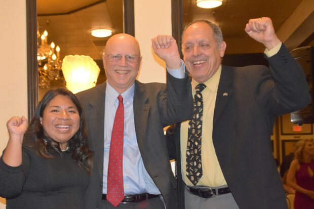 Esmeralda Kinney, the first scholarship recipient of the Mike Rhodes Social Justice Scholarship Fund, with Mike Rhodes and Howard Watkins. Photo courtesy of the San Joaquin College of Law