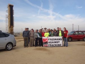 Fresnans Against Fracking and Kern County farmer Tom Frantz at an oil extraction site in Shafter. Photo by Kyla Mitchell