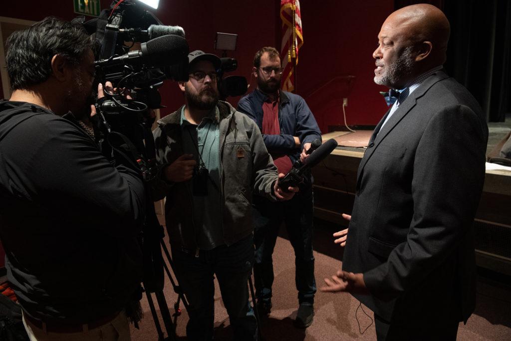 Daren Miller, Ed.D., the facilitator of the Stop the Hate town hall and the primary organizer of the coalition that led to the event, talks to the press before the event. All photos by Peter Maiden