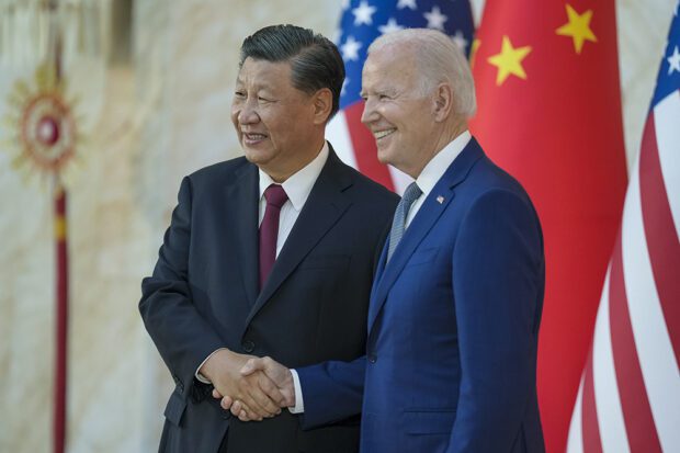 In 2022, U.S. President Joe Biden (right) and Chinese President Xi Jinping met in Indonesia. Both countries are competing for Africa’s natural resources. Photo courtesy of The Commons