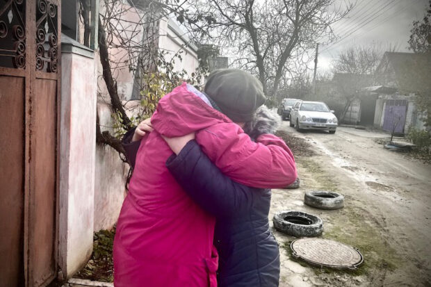 Luba comforts Nina, whose son was murdered by the Russian occupational forces. Photo by Zarina Zabrisky