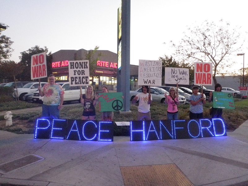 Protests against the threat of war in Syria took place in cities big and small. This antiwar protest took place in Hanford. Photo by Mike Bridges