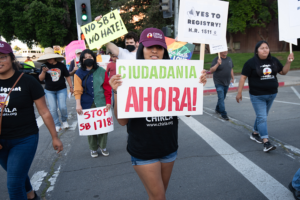 Dozens marched for workers’ and immigrants’ rights in Fresno on May 1. Photo by Peter Maiden