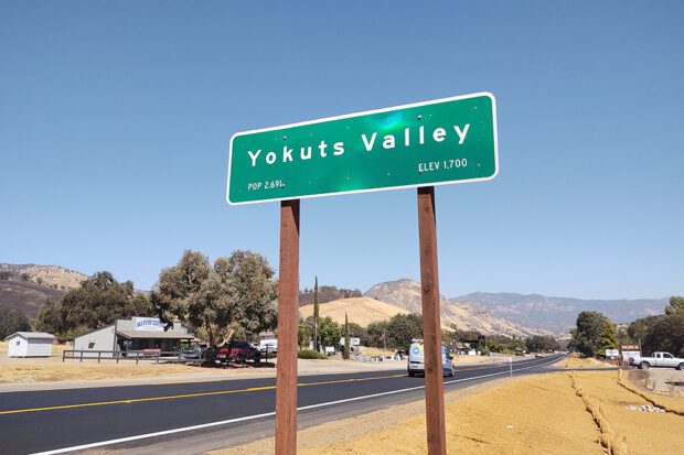 The new sign indicates the name of the community previously known as S— Valley. The new sign has been vandalized several times. Photo by Bob McCloskey